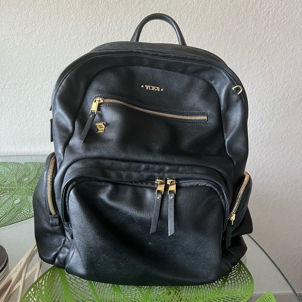 Authentic Tumi Leather Voyager Backpack.